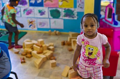 Kaitlyn White (front) and Kimiyah Nuttall play at Little Angels Day Care. (Photo by Kim Palmer)