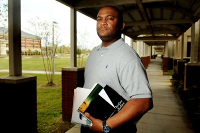 John McGee stands on the campus of Bossier Parish Community College, Sunday November 20, 2011, where he started his education two and a half years ago. He is now taking classes to get his Master's degree at Louisiana State University-Shreveport. (Henrietta Wildsmith/McClatchy)