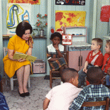 Lady Bird Johnson visiting a classroom for Project Head Start in 1966.