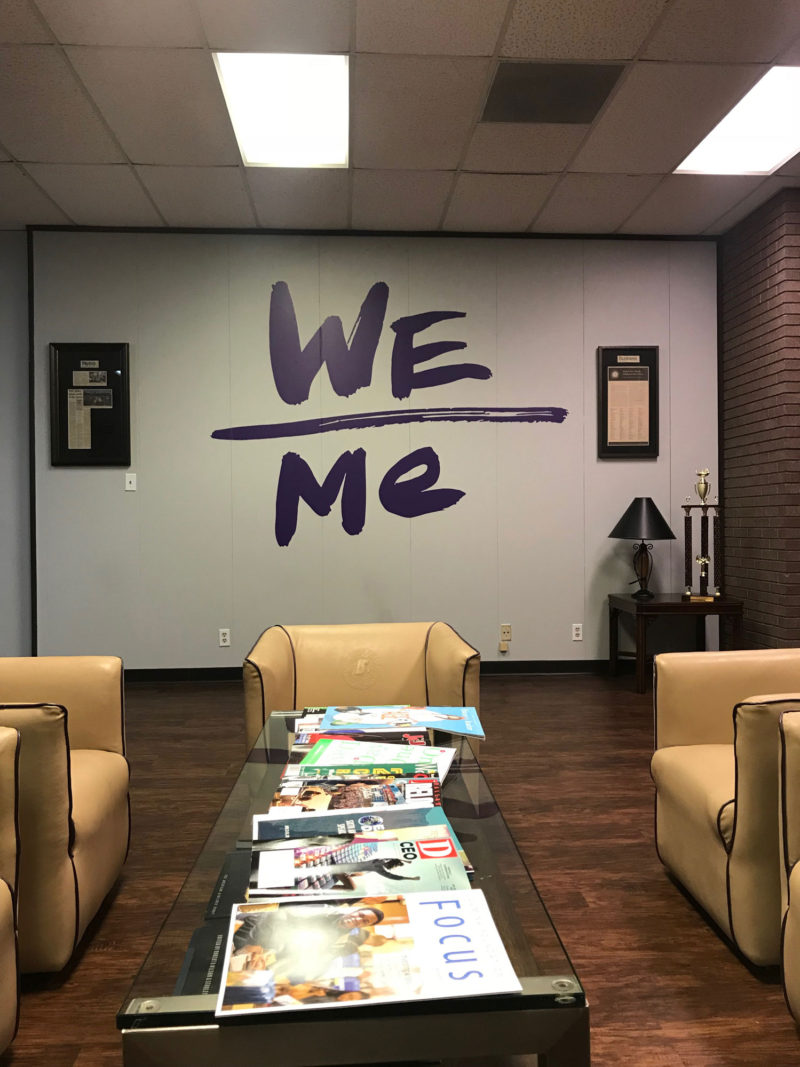 The Paul Quinn College mantra – We over me – is painted at various places around campus.
